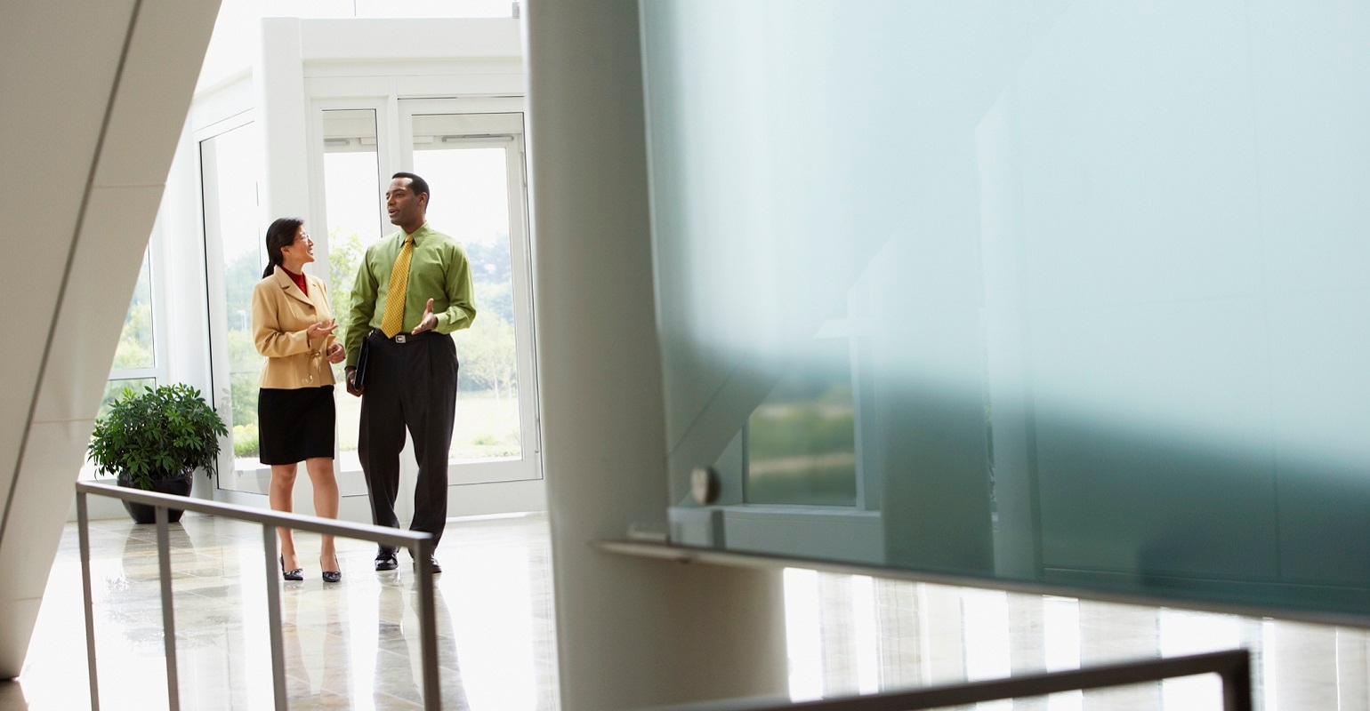 Businesspeople entering office building