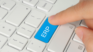finger pressing an ERP button on a keyboard