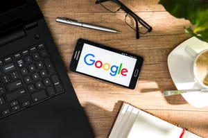 smartphone with Google logo on screen smartphone with Google logo on screen