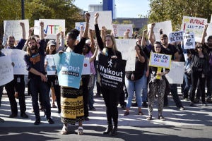 Google employees hold signs during a walkout in Mountain View, on Nov. 1. Photographer: Michael Short/Bloomberg