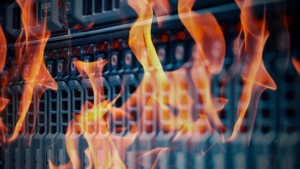 Computer server engulfed in flames.