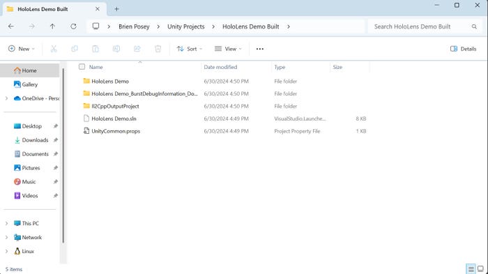 screenshot showing File Explorer window and a HoloLens Demo.sln file screenshot showing File Explorer window and a HoloLens Demo.sln file