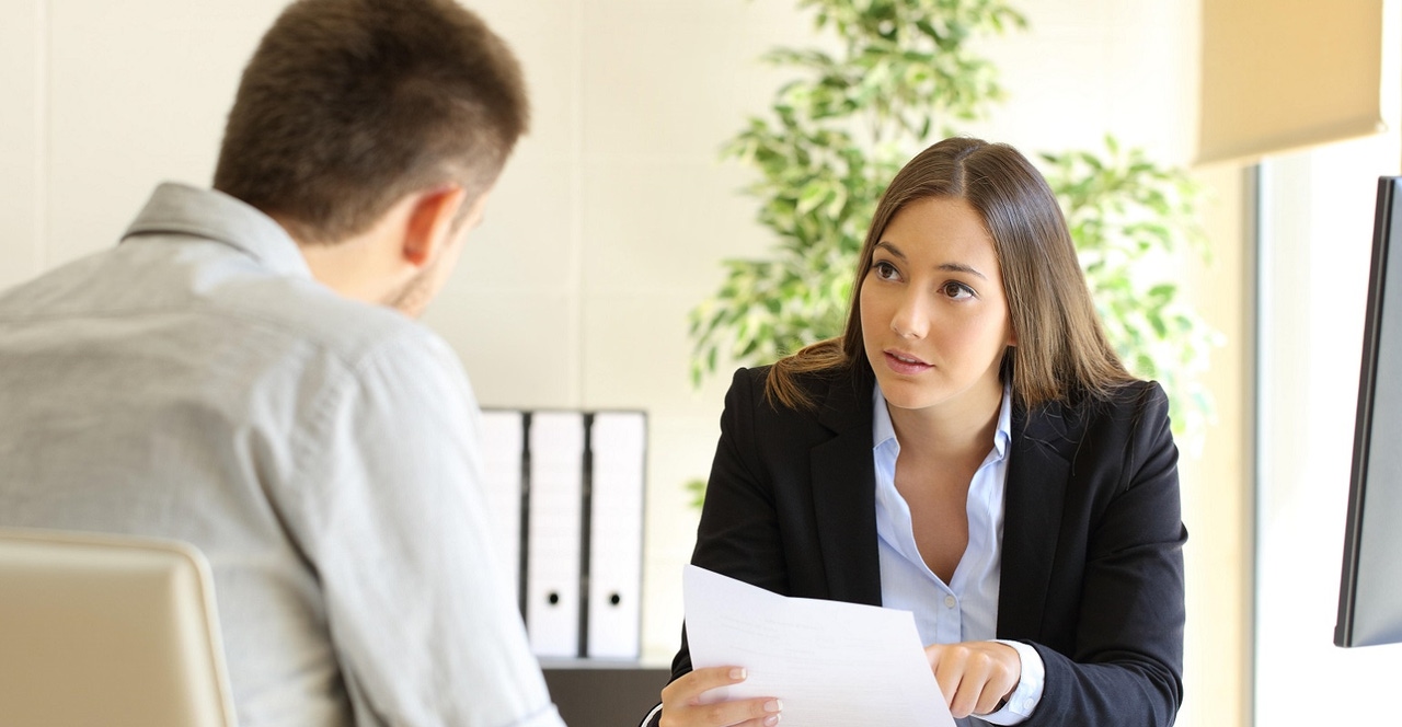 woman interviewing job candidate woman interviewing job candidate