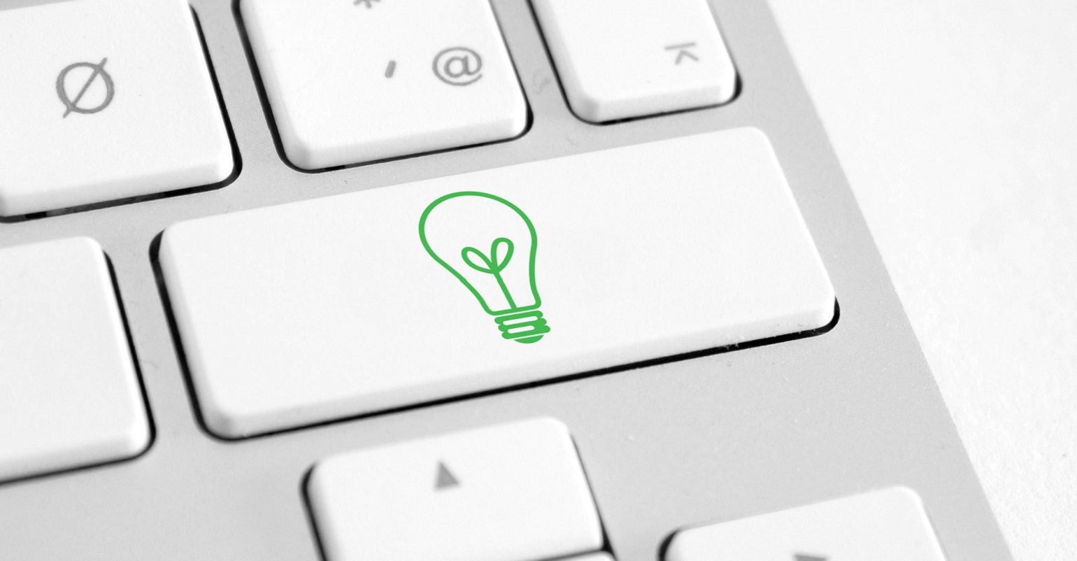 green lightbulb key on keyboard