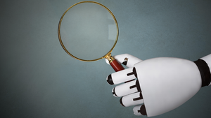close-up of robot's hand holding magnifying glass