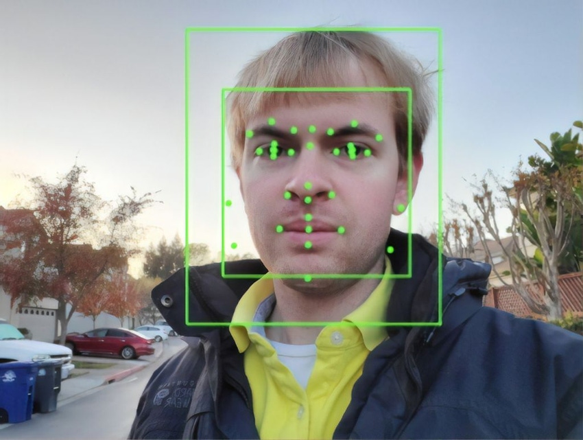 Output of an Artificial Intelligence system from Google Vision, performing Facial Recognition on a photograph.