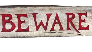 Beware wooden sign
