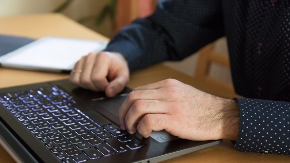 Working on a Laptop Computer