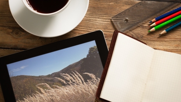 desk with coffee tablet open notebook ruler and colored pencils desk with coffee tablet open notebook ruler and colored pencils