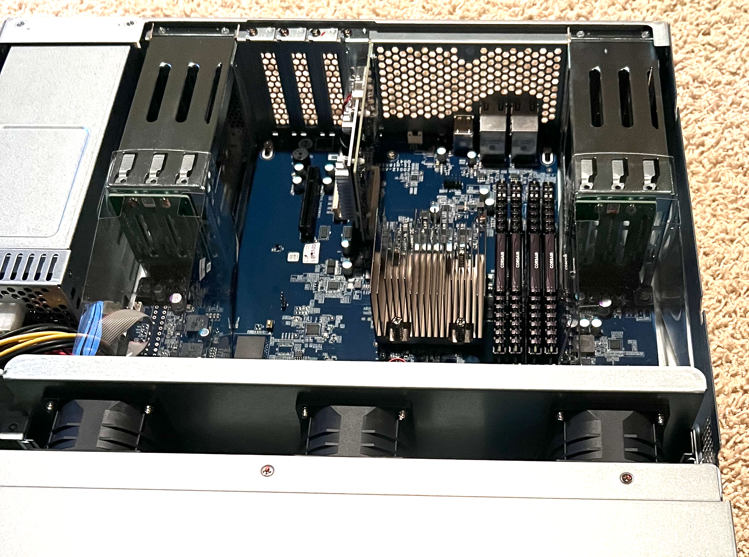 A photo of a NAS appliance on the floor