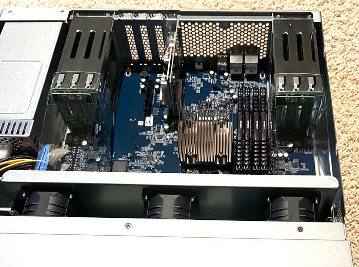 A photo of a NAS appliance on the floor A photo of a NAS appliance on the floor