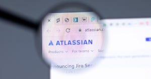 magnifying glass looking at Atlassian web page