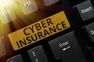 keyboard key with the words Cyber Insurance