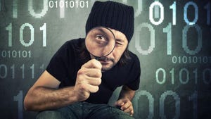 detetecitve dressed in black looking at data detetecitve dressed in black looking at data