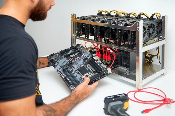 A cryptocurrency unit being built to mine and to trade bitcoin