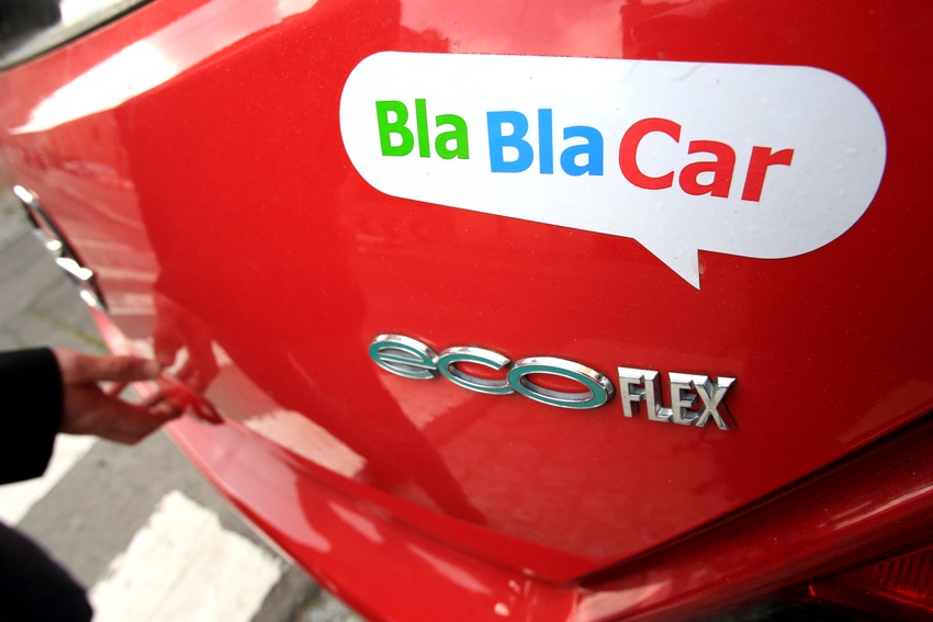 blablacar sticker on back of red car