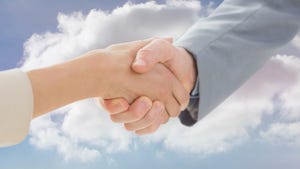 two people shaking hands in front of a cloud