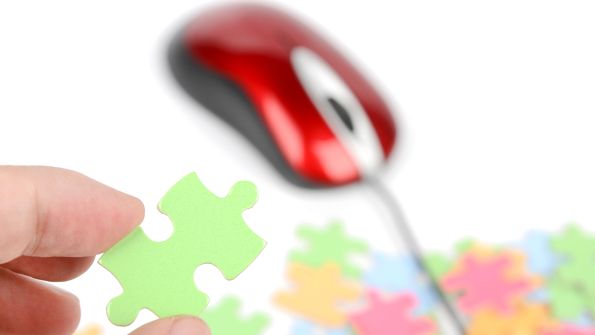puzzle pieces and red computer mouse puzzle pieces and red computer mouse