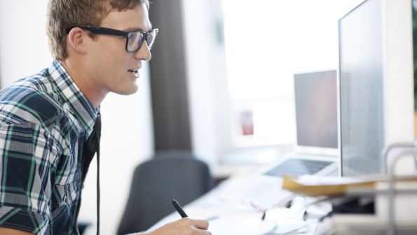 Young man working at a computer