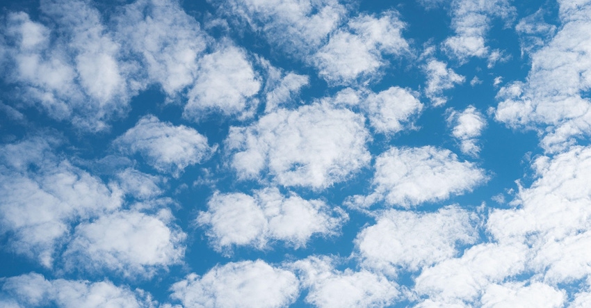 Multiple clouds on blue sunny sky background