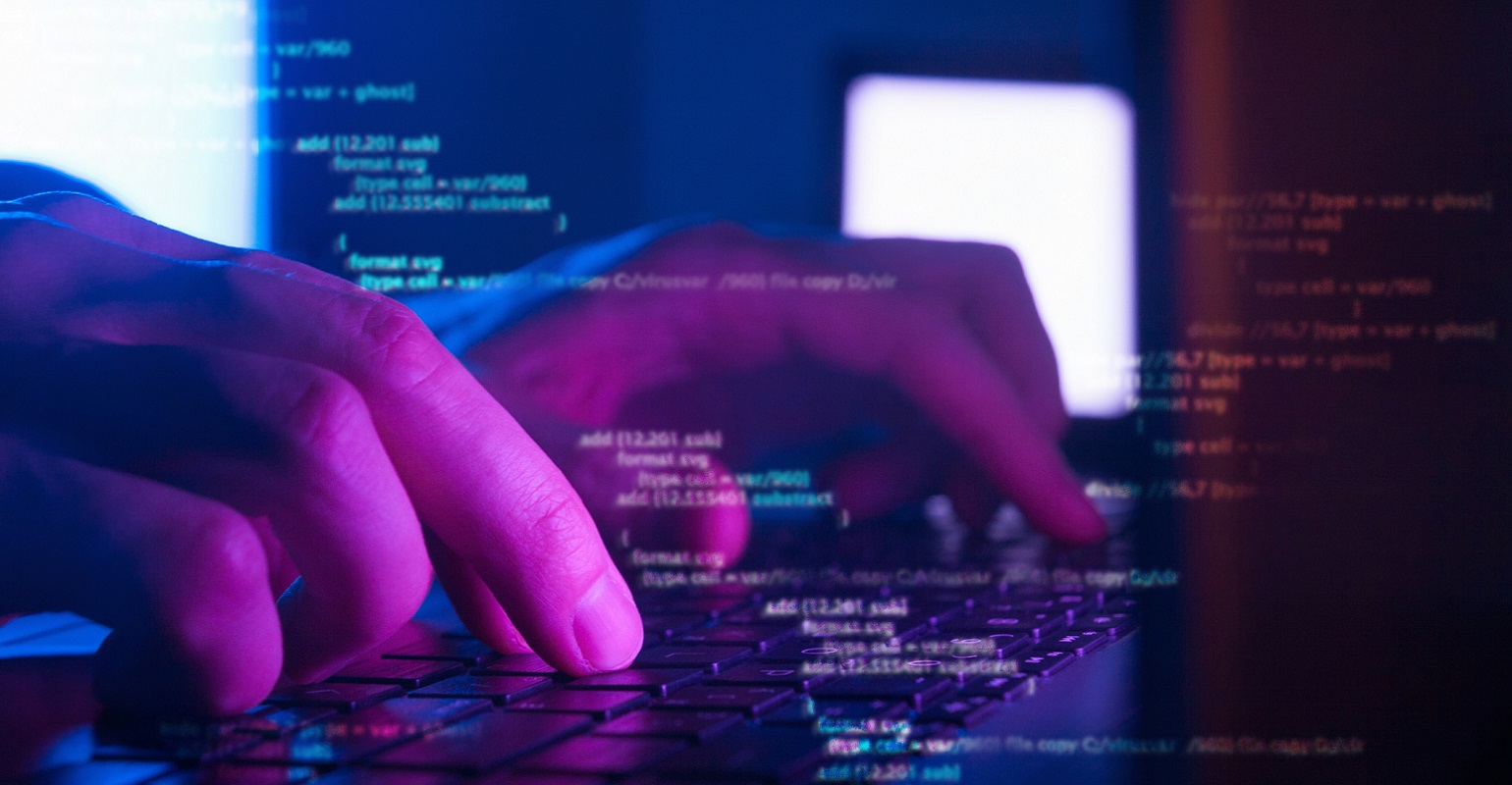 developer typing on keyboard