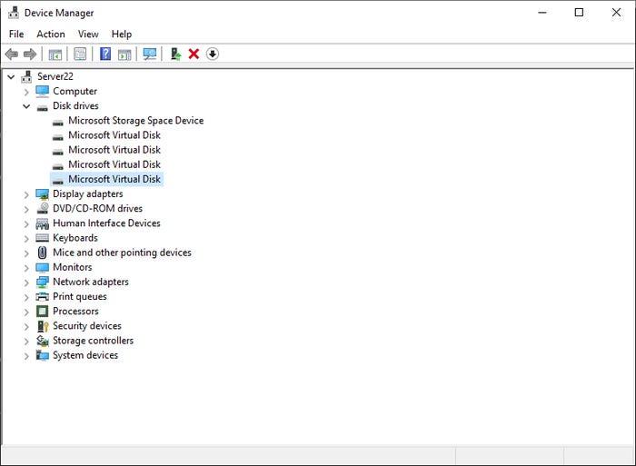 Screenshot of Device Manager with expanded Disk Drives section. It shows four Microsoft Virtual Disks and a Microsoft Storage Space Device. Screenshot of Device Manager with expanded Disk Drives section. It shows four Microsoft Virtual Disks and a Microsoft Storage Space Device.