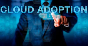 businessman pointing to a cloud with a lock in it with the words "cloud adoption" above it