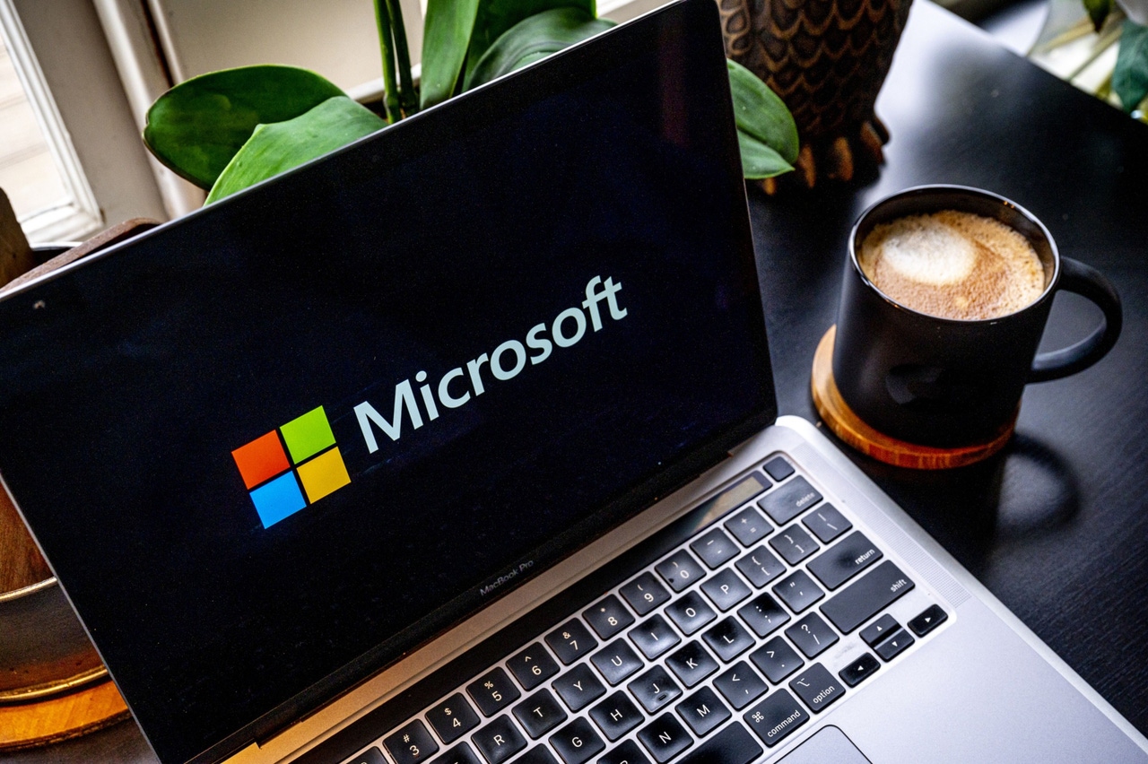 laptop with microsoft logo on the screen laptop with microsoft logo on the screen
