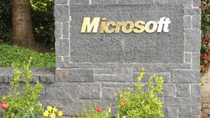 Stone sign with gold letters MICROSOFT