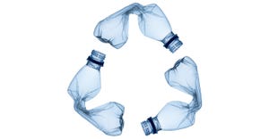 plastic bottles forming recycling symbol