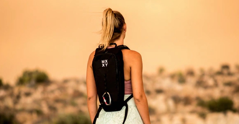 MXXY  Woman with Backpack 770x400