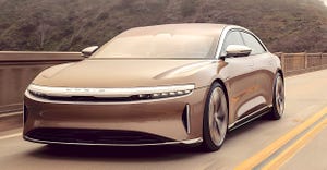lucid-air-exterior-brown action front 34.jpg