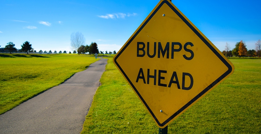 bumps ahead road sign