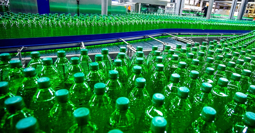 plastic bottles on assembly line