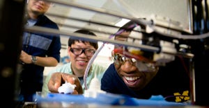 U-M researchers watch 3D printer