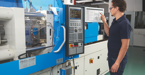 technician and injection molding machine