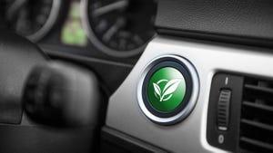 car dashboard with sustainability symbol