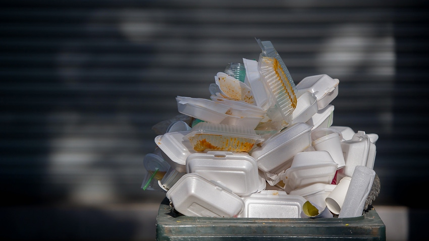 plastic food packaging in trash