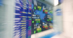 blurry image of stock market board