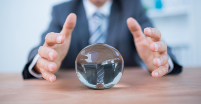 businessman using a crystal ball .png