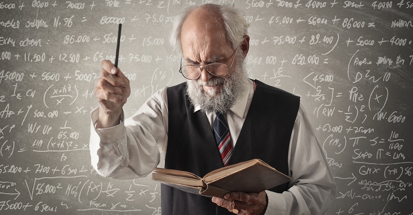 math professor in front of chalkboard