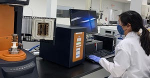 lab technician performing materials testing