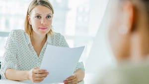 woman looking at resume
