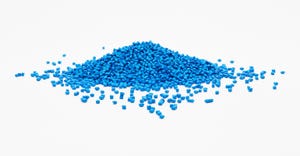 polymer pellets on white background