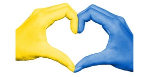 hands painted in colors of Ukraine flag form heart symbol