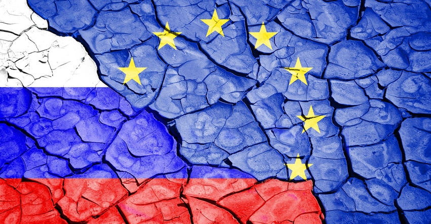 Russian and EU flags on cracked background