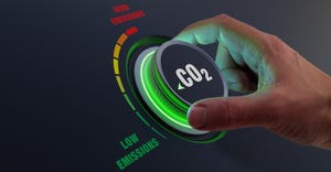 dial turning down CO2 emissions