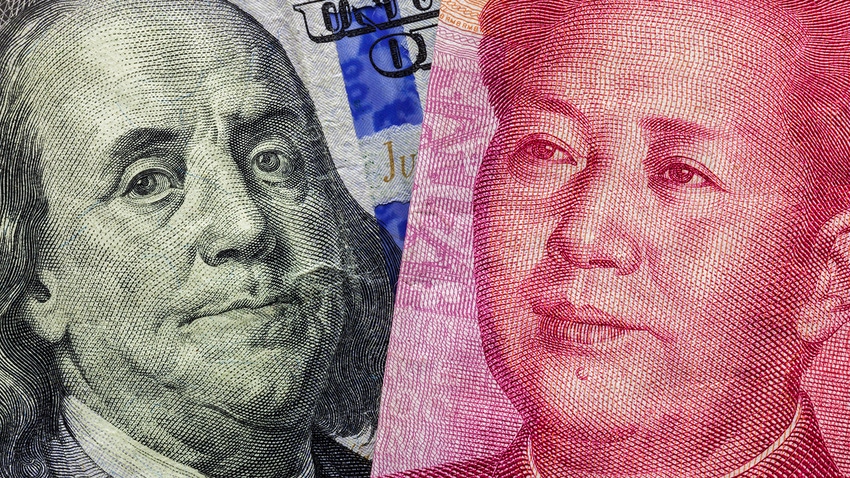 close up of US dollar and yuan