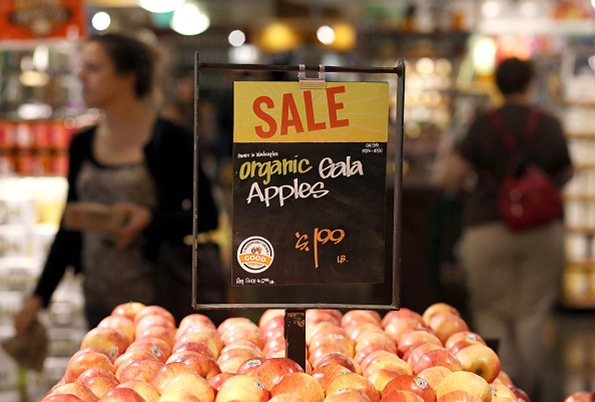 Whole Foods Market continues to feel the heat of competition, price cuts