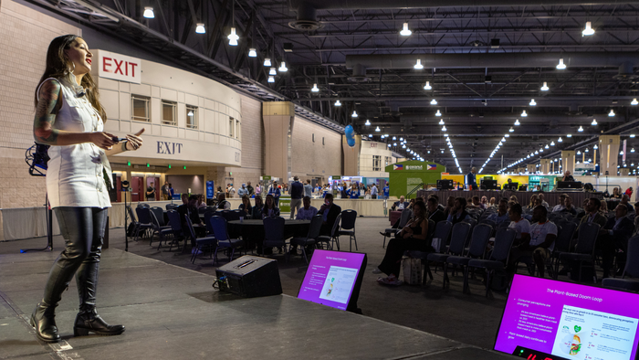 Jennifer Stojkovic delivers her keynote speech during Nutrition Capital Network's Investor Kickoff at Natural Products Expo East